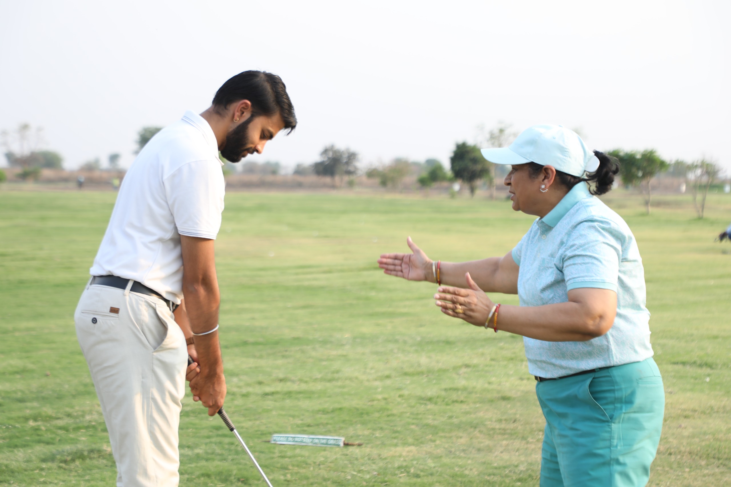 A man playing golf